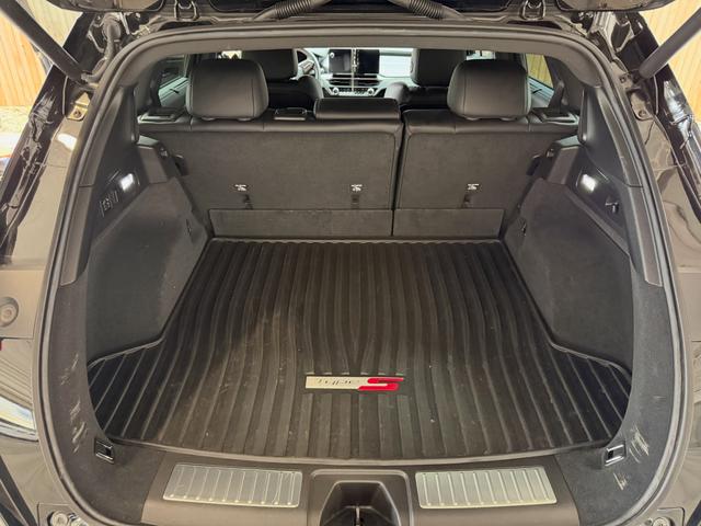 Cargo area of the Acura ZDX after the detail, with a clean liner, vacuumed seatbacks, and wiped trim