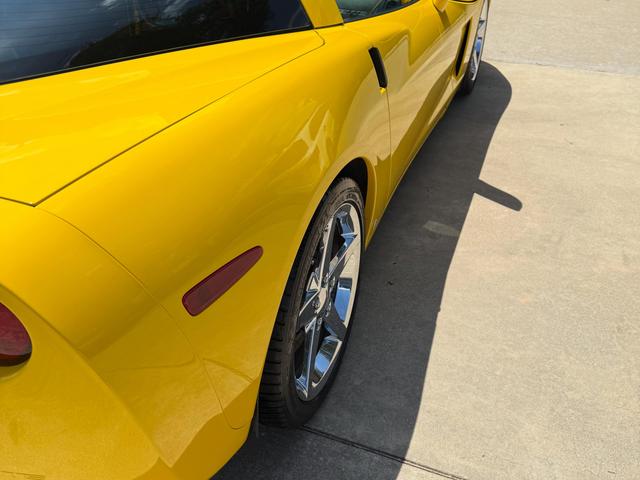 Rear fender of the Velocity Yellow Corvette after the Gold detail, with smooth, high-gloss paint
