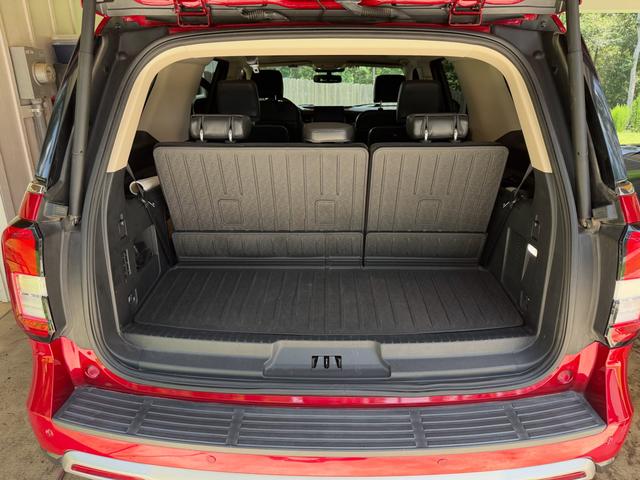 Vacuumed cargo area and folded third row in the back of the Ford Expedition