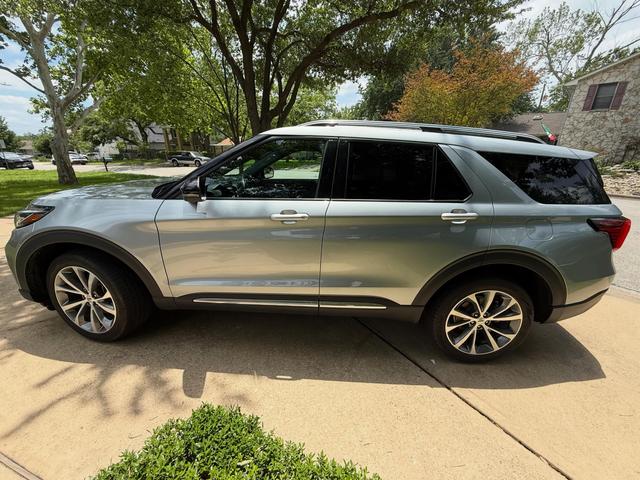 Silver 2025 Ford Explorer Platinum after a Silver mobile detail in an Austin driveway