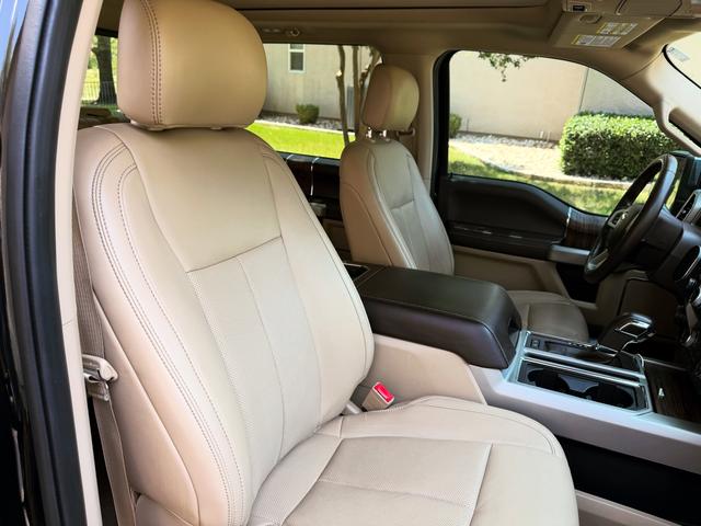 Tan leather passenger seat in the F-150 after cleaning and conditioning