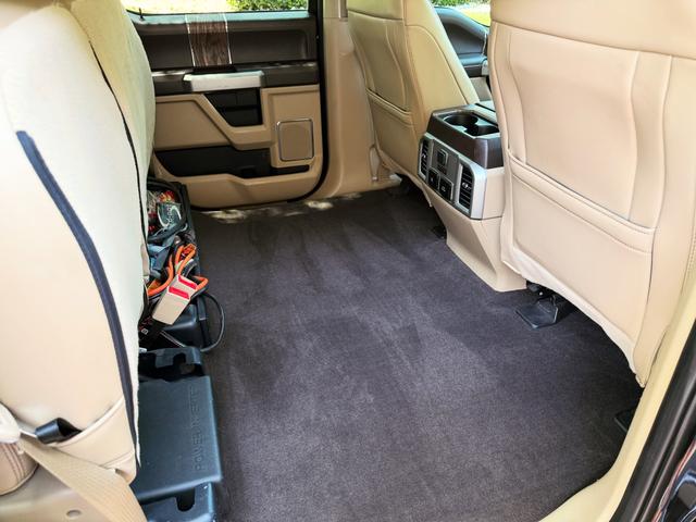 Steamed rear floor carpet in the Ford F-150 crew cab