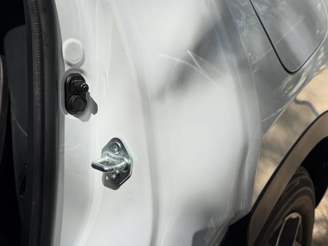 Cleaned CR-V door jamb and striker plate with bright white paint
