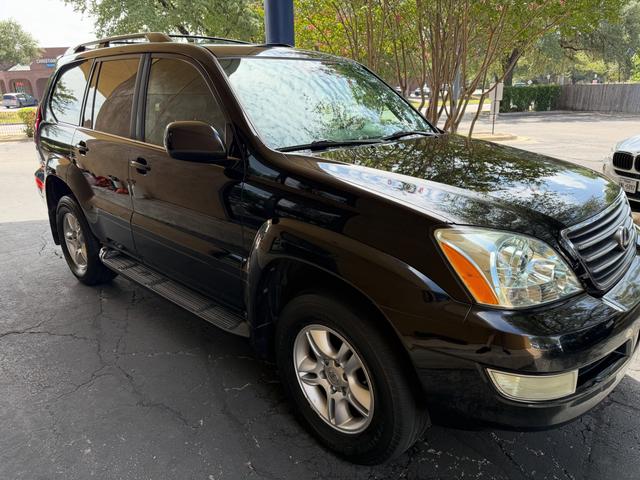Black 2008 Lexus GX470 after a mobile detail in Austin, with glossy paint and clean alloy wheels