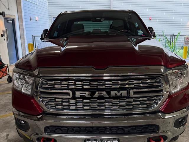 Polished chrome grille on the red Ram 1500 Lone Star
