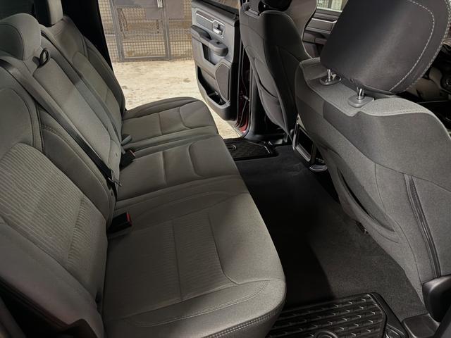 Rear bench of the red Ram 1500 after a Silver mobile detail in Austin