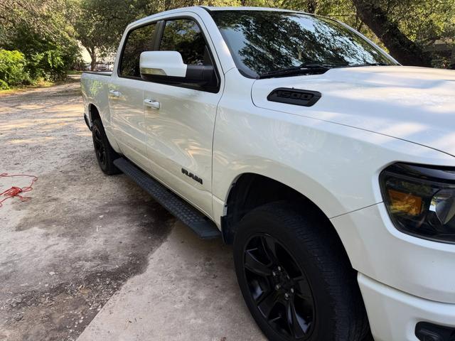 White Ram 1500 Lone Star after a Silver mobile detail in Austin, with black wheels and bright paint