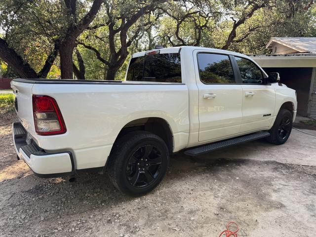White Ram 1500 bedside and doors shining in the sun after a hand wash