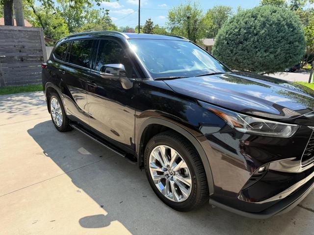 Black 2021 Toyota Highlander Limited after a Silver mobile detail in an Austin driveway