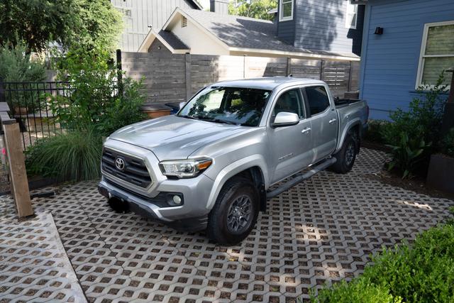 Silver Toyota Tacoma after a mobile truck detail on an Austin driveway