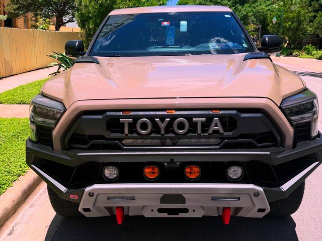 Clean grille, amber marker lights, and bumper on the front of the Tundra TRD Pro